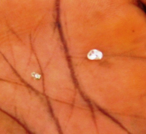 Two small diamonds that an artisanal miner found in Liberia